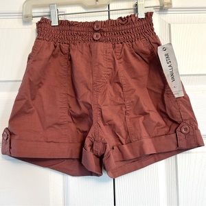 Size small Vanilla Star brand rose colored shorts.